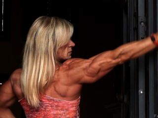Muscle Milf Kris Flexes Her Erotic, Veiny Body In Tight Clothes